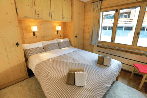 Master bedroom with two large wardrobes